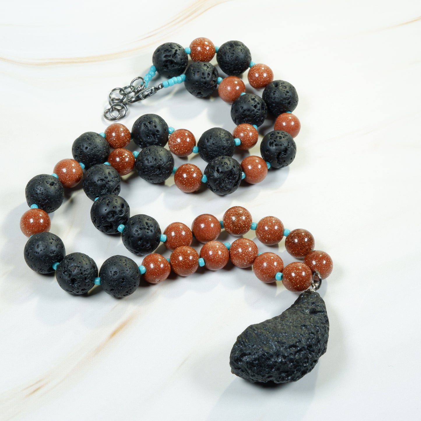 Tektite with Goldstone and Lava Rock