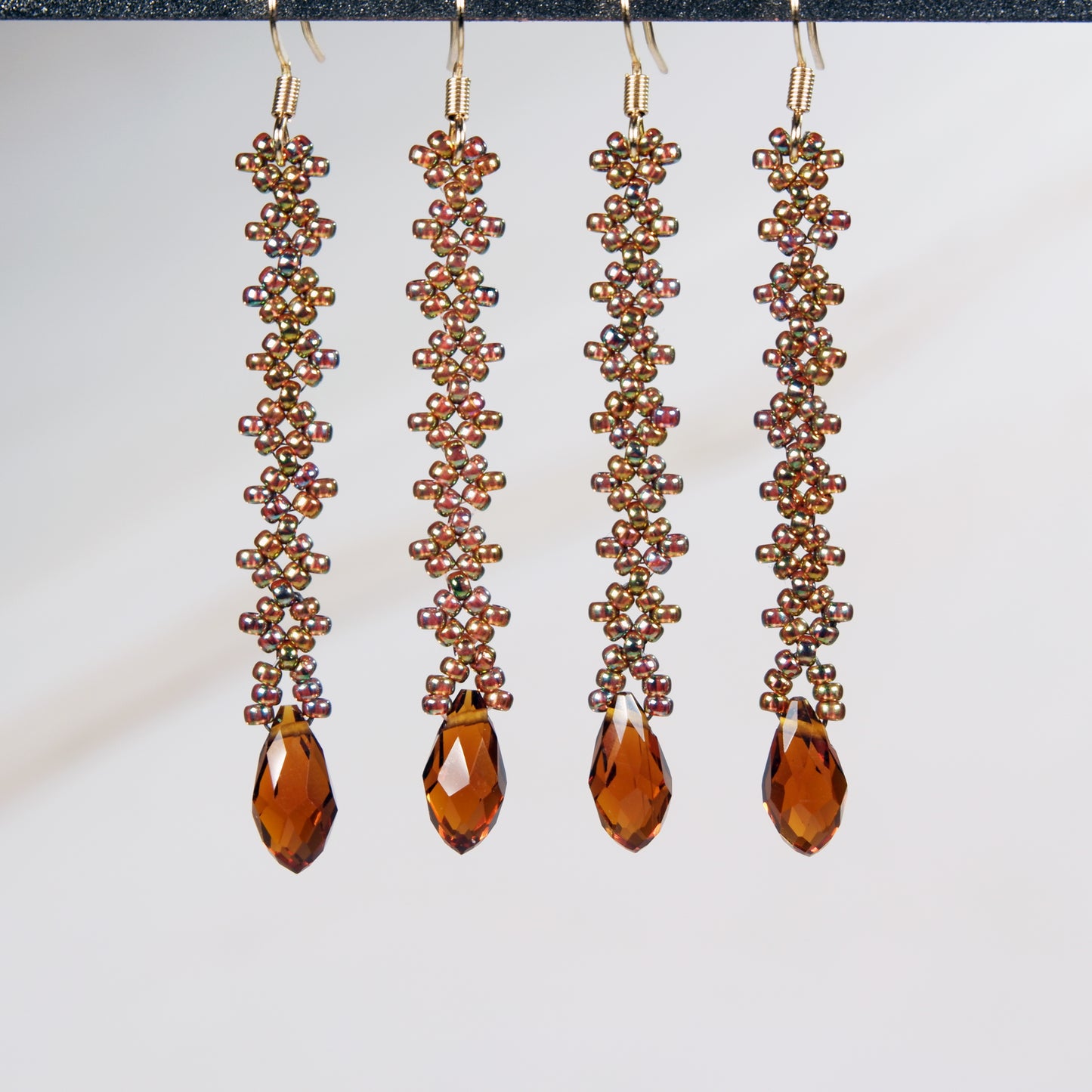 Long Iridescent Green Earrings with Celestial Crystal